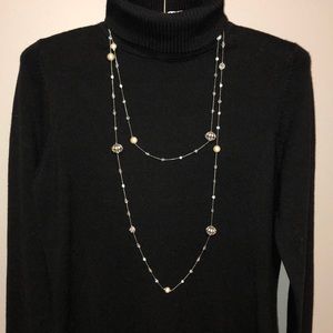 Long strand necklace
